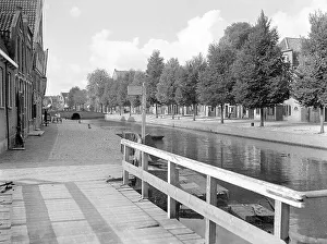 Canals. Boats and streets in Holland