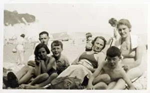 Beachwear Prints: A candid Seaside Family Photograph - White Cliffs and pebble beach at Beer, South Devon