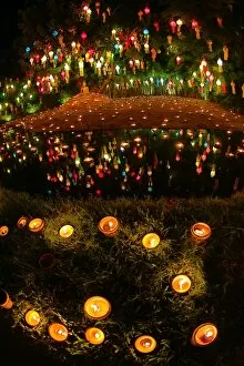 Images Dated 9th November 2014: Candles and lanterns at Wat Phan Tao Temple, Chiang Mai