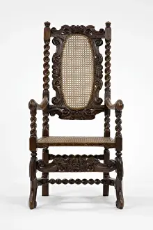 Caned armchair