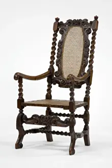 Caned armchair