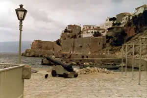 A Cannon by the harbour on a Greek Island
