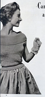 Beaded Collection: A canoe-necked knitted top, with a beaded design. Date: 1954