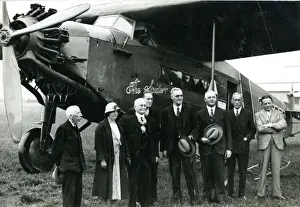 Barnard Prints: Capt C. D. Barnard, fourth from left, pilot, in front of ?