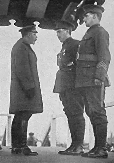 Recipient Prints: Captain Angus Buchanan receiving the VC and Military Medal