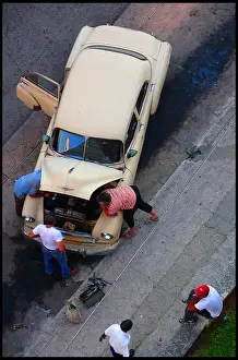 Car repairs in street, Havana Cuba