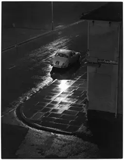 Car on Wet Street