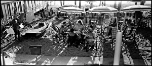 Card players on the beach at Marina di Pisa, Italy Card players on the beach at Marina di Pisa, Italy