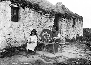 Girl at a spinning wheel
