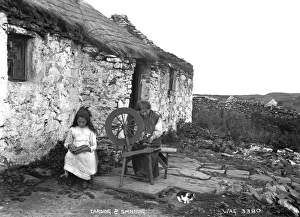 Girl at a spinning wheel