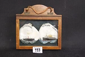 Images Dated 5th March 2018: Carpathia and Titanic - decorated shells in oak frame