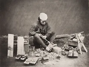 Carpenter, shoe maker making wooden shoes, Japan