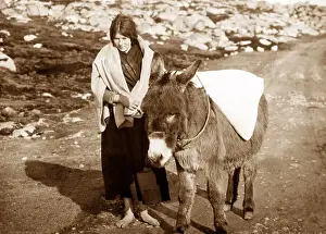 Carrying flour, Gorumna, West of Ireland, early 1900s