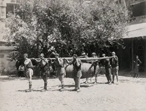 Carrying a wine or water barrel, Constantinople, Istanbul, T Carrying a wine or water barrel, Constantinople, Istanbul, T