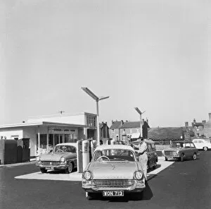 Images Dated 4th December 2009: Cars at a Petrol Station