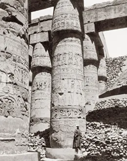 Carved pillar ancient ruins, Egypt, with figure