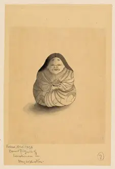 Carving of a woman, seated, facing front