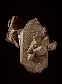 Oxide Prints: Cassiterite pseudomorphous after orthoclase