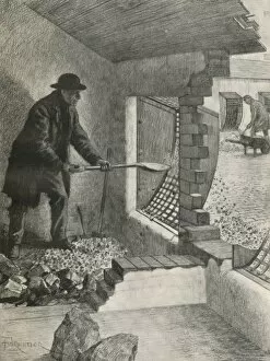 Adjoining Gallery: A casual worker shovelling stones from his cell