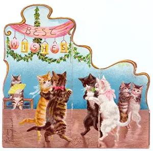 Cats dancing on a Christmas card