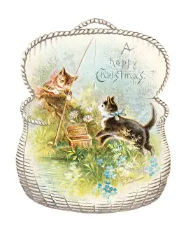 Two cats fishing on a cutout Christmas card