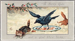 Two cats running from a bird on a New Year card Two cats running from a bird on a New Year card