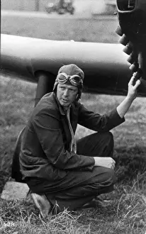 Charles A Lindbergh inspects his Miles M12 Mohawk G-AEKW