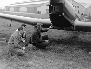 Inspects Prints: Charles A Lindbergh inspects his Miles M12 Mohawk G-AEKW