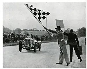 Chequered Prints: Charley Dodson crossing the finishing line