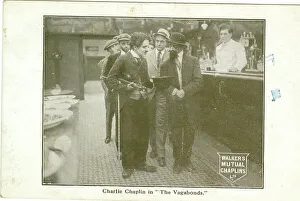 Mutual Prints: Charlie Chaplin with members of the cast of The Vagabonds