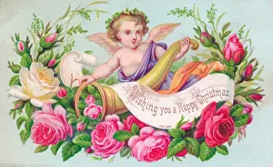 Cherub with pink roses on a Christmas card