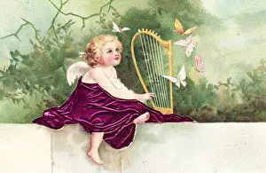 Cherub Prints: Cherub playing a harp on a greetings postcard
