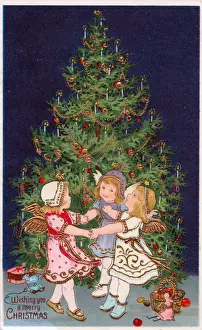 Cherubs with tree and presents on a Christmas postcard