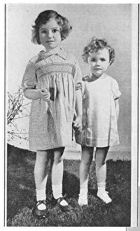 New Images July 2023 Collection: Two child models wearing smocked dresses. Date: 1935