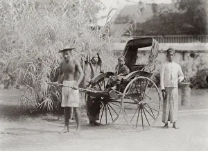 Child in a rickshaw, jinrikisha, Singapore