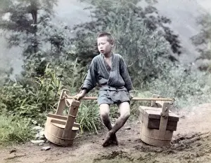 Child street vendor with baskets, Japan, circa 1880s