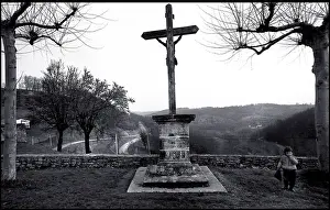 Child at village memorial, France