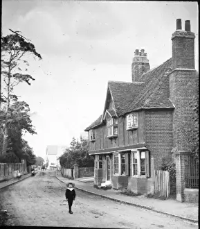 Empty Prints: Child walking along street