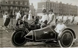 Three children on a 1930 JAP Special motorcycle & sidecar