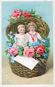Wickerwork Gallery: Children in a basket of flowers on a greetings postcard