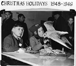 Children with bird specimens, 1948. The Natural History Mus