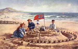 Sand Castle Prints: Children build a fantastic sandcastle on summer beach holiday