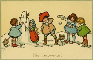 Images Dated 20th July 2011: Children building a snowman