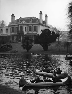Mansions Prints: Children canoeing on the boating lake in the grounds of Ravenscourt House, Hammersmith