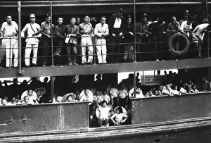 Evacuated Prints: Children of the Chinese city of Hankou, Wuhan, are evacuated by boat as the city comes