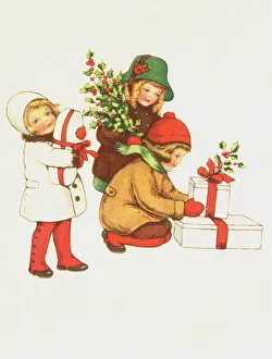 Images Dated 23rd March 2018: Children with Christmas presents and sprigs of holly