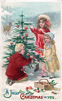 Apples Gallery: Children decorating a tree on a Christmas postcard