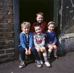 Children on doorstep in a Balham street, SW London