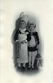 Pretending Prints: Two children in fancy dress; the little boy is dressed as a chef while a little girl