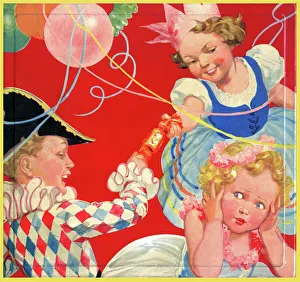 Children in fancy dress pulling a Christmas cracker